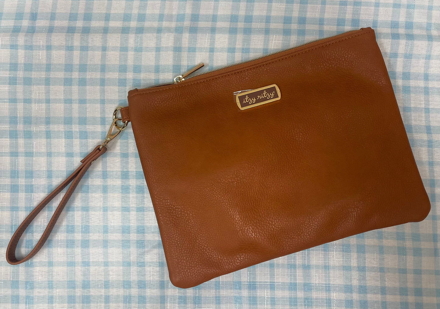 Itzy Ritzy Changing Wristlet- Cognac